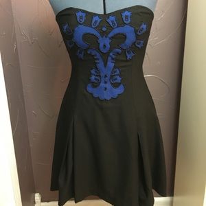 Black and blue appliqué dress